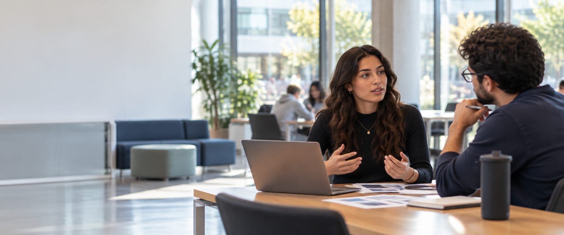 A founder and a mentor reviewing a pitch together